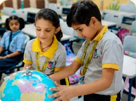 Kindori IB World School students exploring a globe in class — Jaipur Kindori IB World School students exploring a globe in class — Jaipur